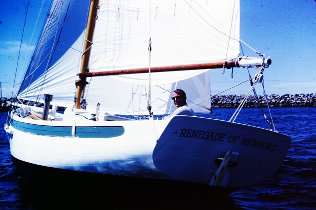 Dad_at_helm_of_Renegade_in_entrance_channel